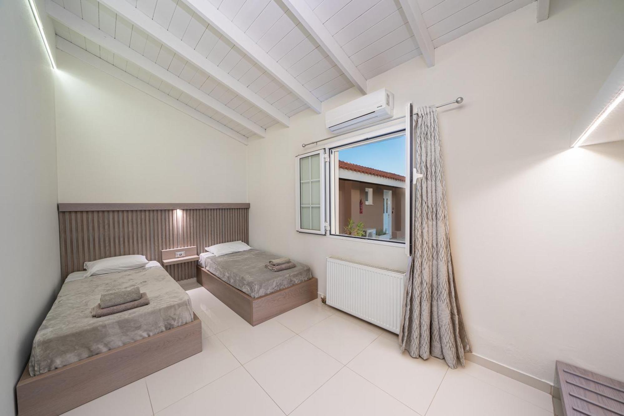 The "L" Suites & Apartments อาร์กอสโตลี ห้อง รูปภาพ